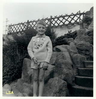 With Butlin's chalet key and badges With Butlin's chalet key and badges